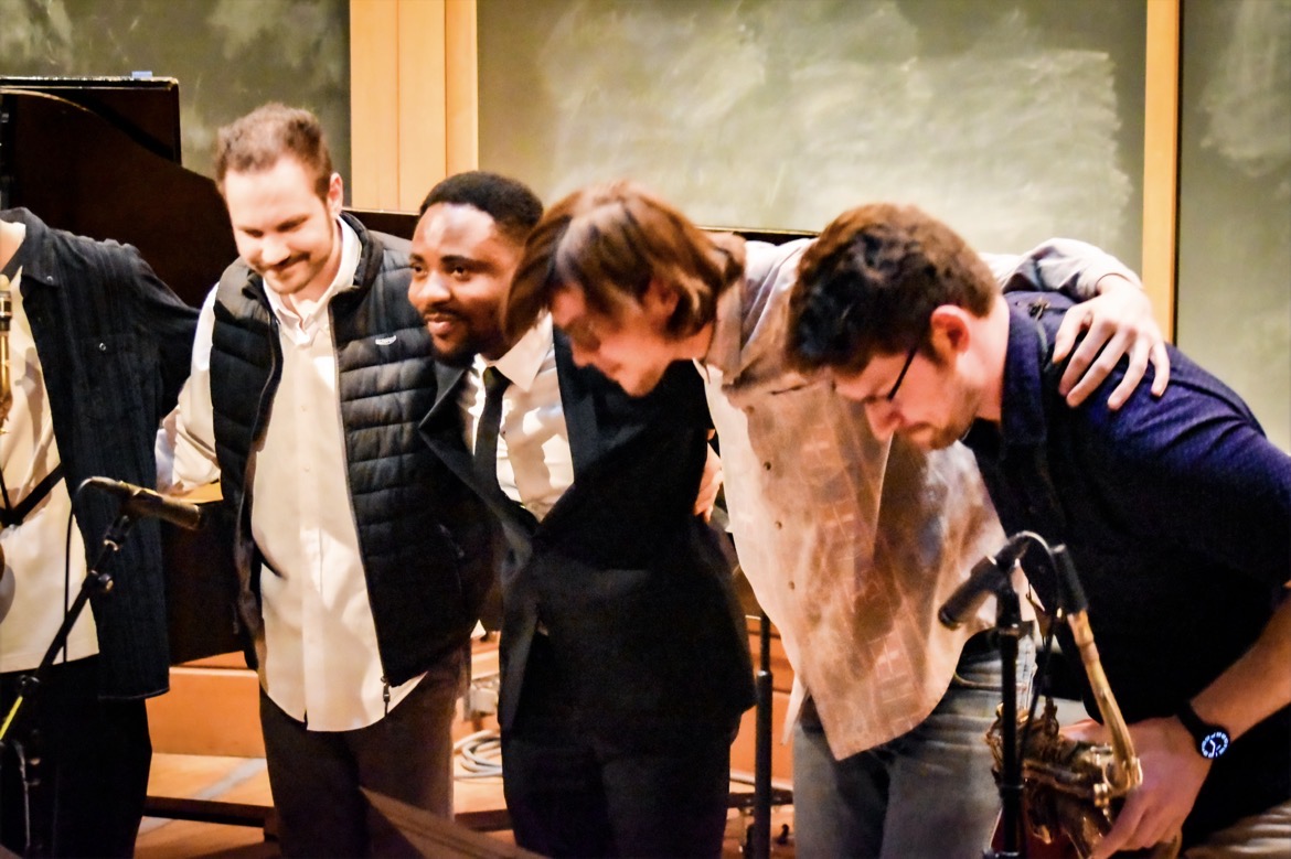 Bows after the set with the band